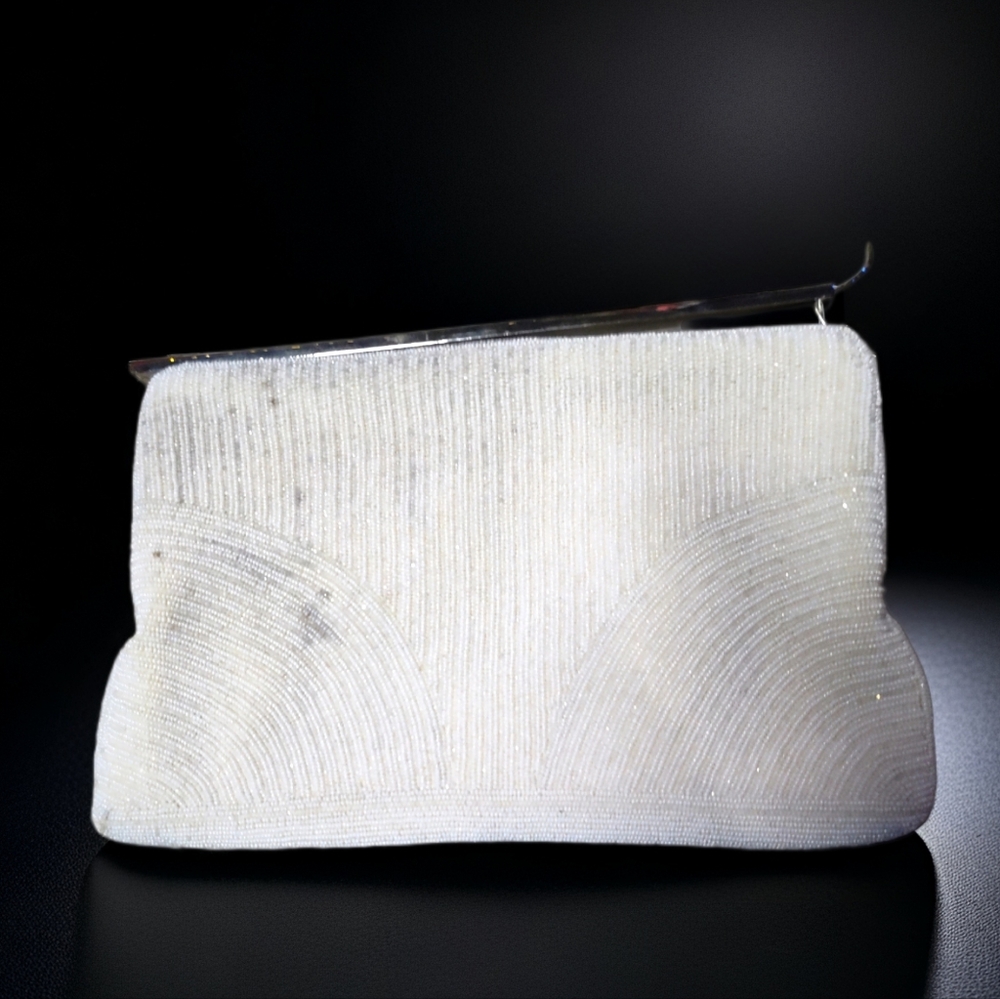 Walborg hand made in Belgium off white beaded clutch with silk inside.